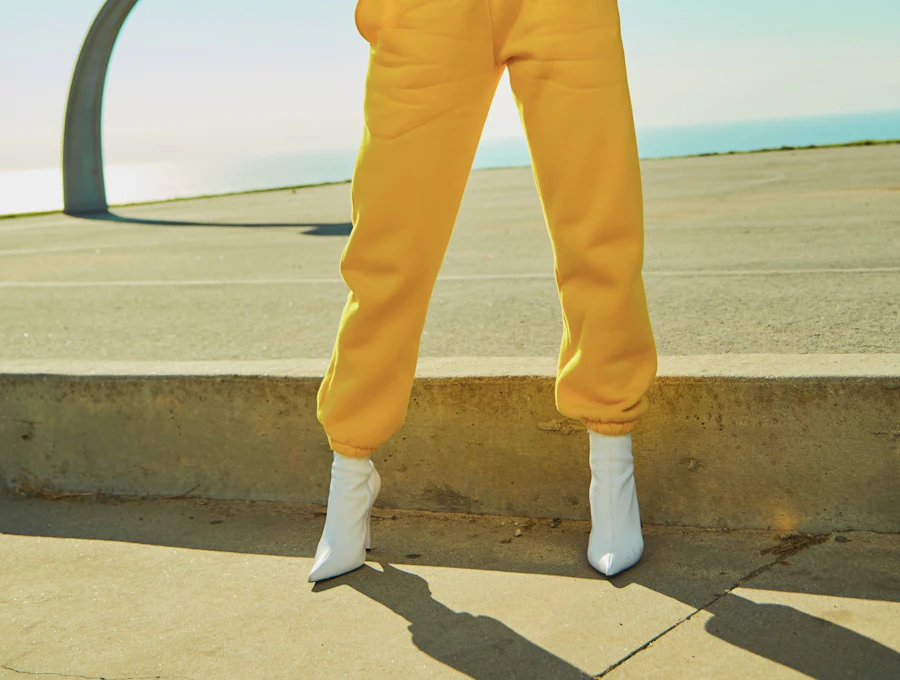 Mustard yellow joggers with white boots