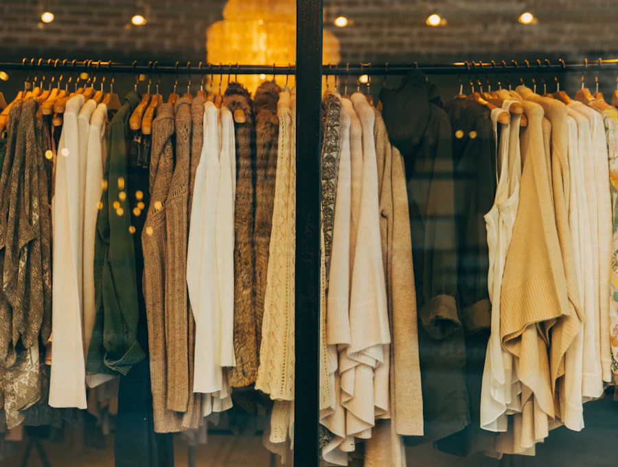 Rail of neutral-coloured clothes in a boutique