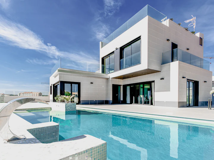 Modern white villa with a swimming pool